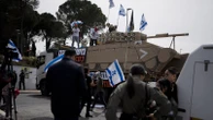 With its soldiers mired in Gaza, Israel fights a battle at home over drafting the ultra-Orthodox