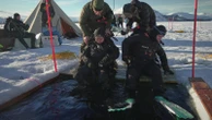 Scientists train to dive beneath polar ice as climate change warms the Arctic and Antarctica