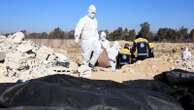 Syrians uncovering 'massive' graves could find 100,000 bodies, NGO says