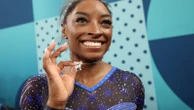 Simone Biles shows off sparkling goat necklace amid historic Olympic gold medal winBiles has some new bling.8/2/2024 01:42:12 EDT