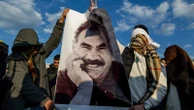 Kurdish fighters in Iraq to hand over weapons in first step toward disarmament