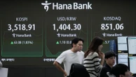 Asian shares are mostly lower following Wall Street's pause from its feverish rally