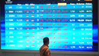 Global shares trade mixed as focus shifts to Fed's next move