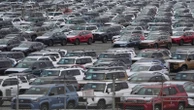 Toyota reports booming sales but stays cautious on profit because of various costs