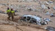 A crowd of Spain's flood survivors toss mud and shout insults at King Felipe VI