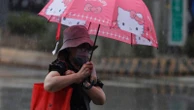 China cancels schools and flights as it braces for typhoon
