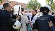Greek riot police scuffle with protesting doctors during hospital tour by PM Mitsotakis