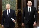 A Russian media outlet is raided in Azerbaijan's capital as tensions rise between Moscow and Baku