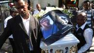 Mourners bury journalist killed in one of Haiti's worst attacks on reporters