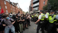 Rival anti-migrant and anti-racism protests face off outside a hotel housing migrants in London