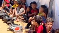 Gazan children wait for food in long lines as starvation looms