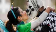 AP PHOTOS: Revelers in costumes take to the streets of Germany to kick off carnival celebrations