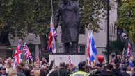 Supporters of far-right British figure rally as anti-racism demonstrators mount counter-protest