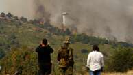 Hundreds of firefighters battle a deadly forest fire raging in southern Greece for the third day