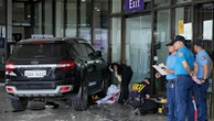 Vehicle crashes into entrance at Manila airport, killing 2 people including a 4-year-old girl