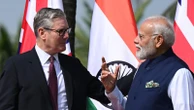 British and Indian prime ministers promote trade deal during visit by Starmer