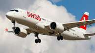 Swiss Air flight diverts with smoke on board; crew member, 10 passengers hospitalized