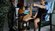 Colombian soldiers find solace in 'furry force' emotional support dogs