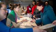 Lithuanians vote in parliamentary election with many looking for change despite a strong economy