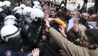 Protesters scuffle with police in Serbia as they demand arrests over a deadly roof collapse