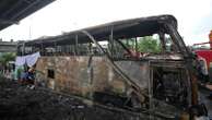 Thai police arrest driver and work to identify victims of the school bus fire that killed 23