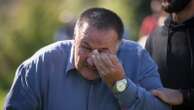 Hundreds attend a funeral service in southern Bosnia for 19 killed in devastating floods