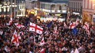 Tens of thousands march against Georgia's government as local election snubbed by opposition held