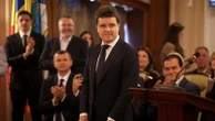 Romania's new president is sworn in as a political crisis eases, but challenges loom