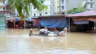 Bridge collapses as more rain falls in Vietnam and storm deaths rise to 21