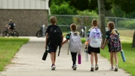 As students across the US head back to class, are schools ready to handle COVID-19?
