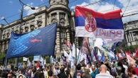 Thousands in Serbia mark 6 months since a train station canopy crash that triggered mass protests