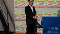 Hong Kong holds first council elections under new rules that shut out pro-democracy candidates