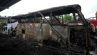 Operator of a Thai bus that caught fire and killed 23 is charged, as investigators suspect gas leak