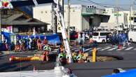 Sinkhole swallows truck in Japan, trapping driver inside