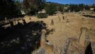 Grave by grave, a new project in divided Cyprus tries to mend mistrust