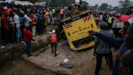 A bus carrying mourners from a funeral overturns in Kenya, killing 25 people