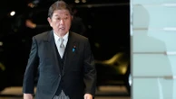 Japan says it plans to tell Trump it will build up military, upgrade security strategy