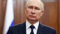 Putin visits a shipyard to oversee the commissioning of new Russian nuclear submarines