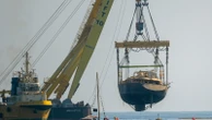 The recovered Bayesian superyacht takes its final journey to a Sicilian port