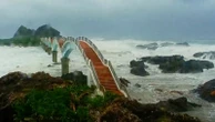 Typhoon Podul brings no major damage as it crosses Taiwan and heads for China