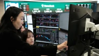 Asian shares mostly gain while oil prices keep rising