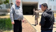 Prosecutors in Thailand say they won't pursue royal defamation case against US scholar