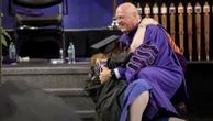 Clemson president gets 'joyful tackle' from graduating daughterClemson president James P. Clements shared a viral moment with his daughter.12 minutes ago