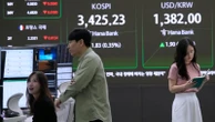 Asian shares mostly climb after US stocks remained near record levels following the Fed's rate cut