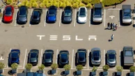 Profits at Musk's car company plunged again last quarter even as it sold more vehicles