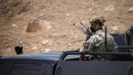Kurdish separatist fighters in Iraq begin laying down weapons as part of peace deal