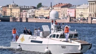 Russia scales down celebrations honoring its navy as Ukraine launches more drone attacks