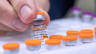 FDA requires updated warning about rare heart risk with COVID shots