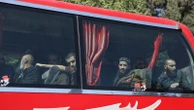 Syrian government and Kurdish-led force exchange prisoners in a step toward easing tensions