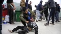 The Latest | Aid groups describe an 'unimaginable' situation after visiting a packed Gaza hospital